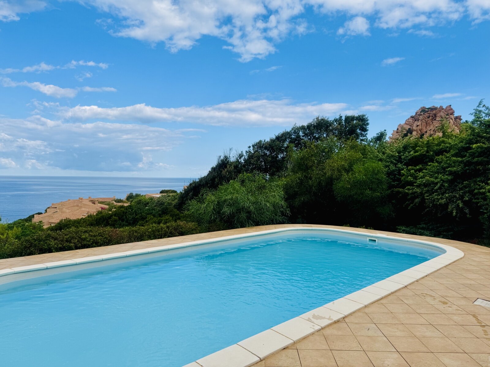Exclusive sea view paradise: pool with breathtaking panoramic view of the sea and rocky landscape Exclusive sea view paradise: pool with breathtaking panoramic view of the sea and rocky landscape