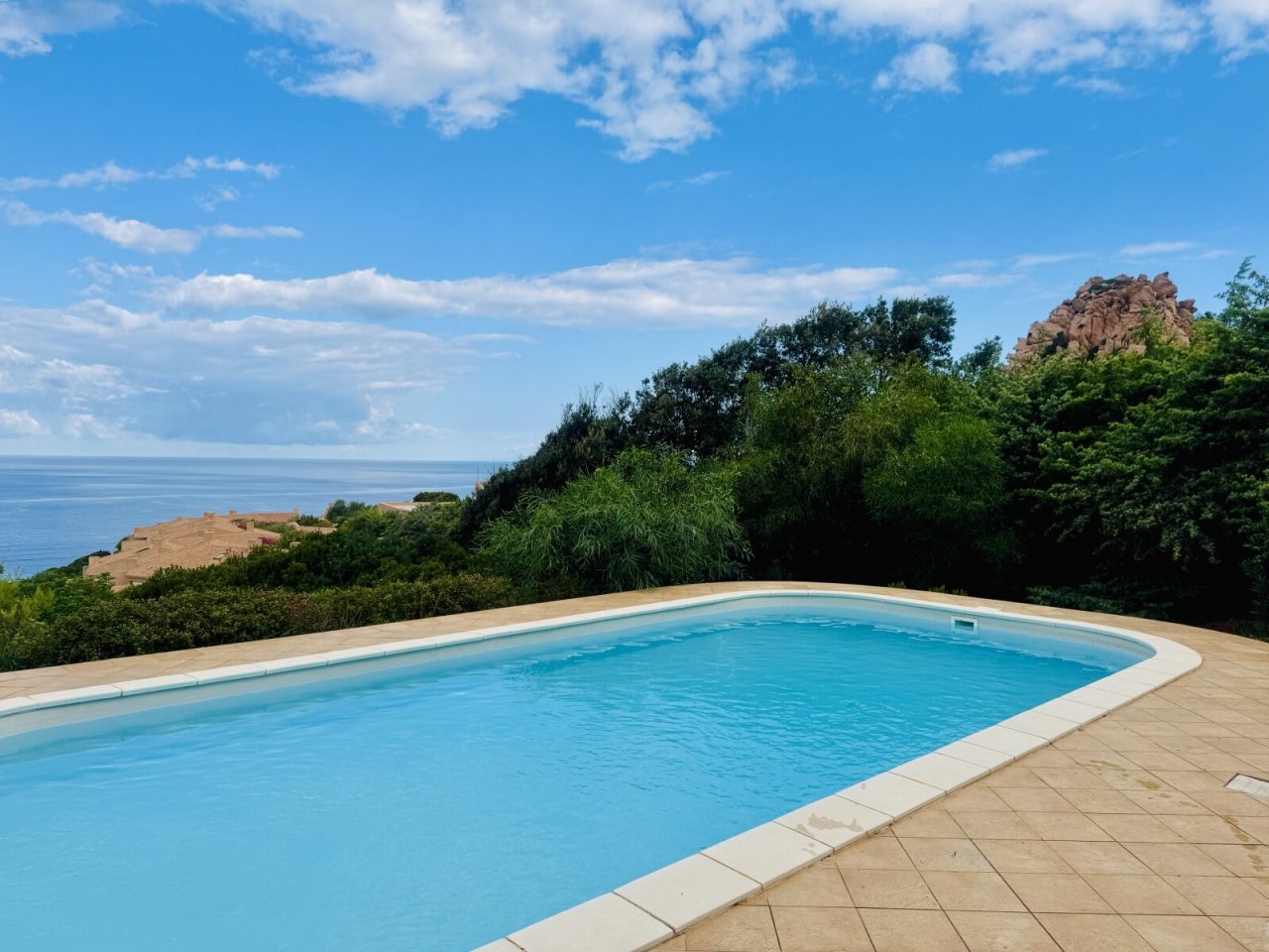Exclusive sea view paradise: pool with breathtaking panoramic view of the sea and rocky landscape