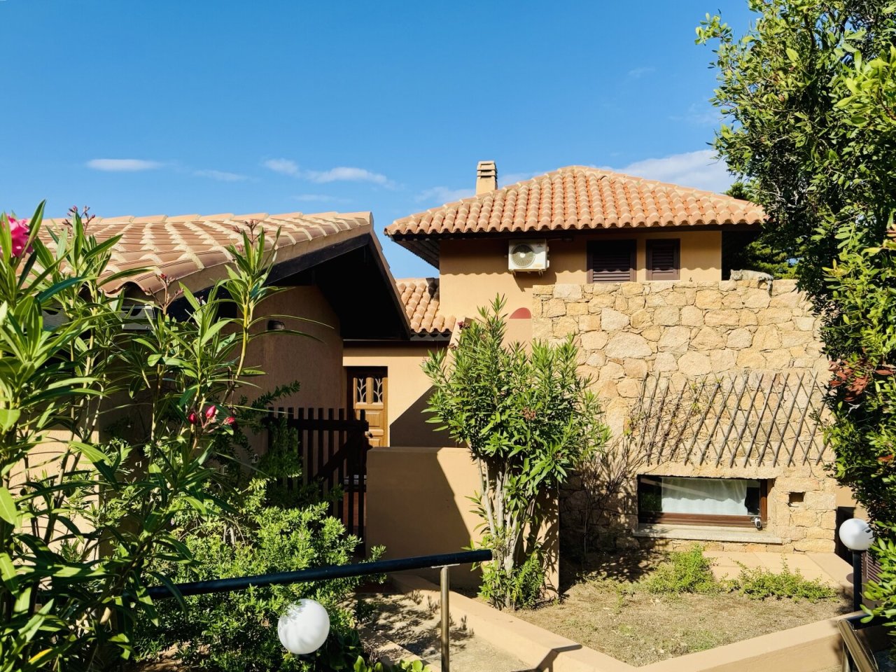 Mediterranean natural stone villa with charming terracotta roof structure – your dream home amidst greenery and sunshine!