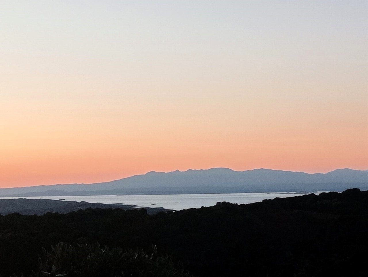 Unobstructed distant view over the lake and mountain range – natural, unspoiled vantage point Unobstructed distant view over the lake and mountain range – natural, unspoiled vantage point